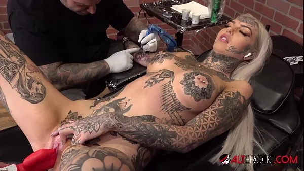 Hot Beautiful busty blonde uses a toy while having her arm tattooed new Clips